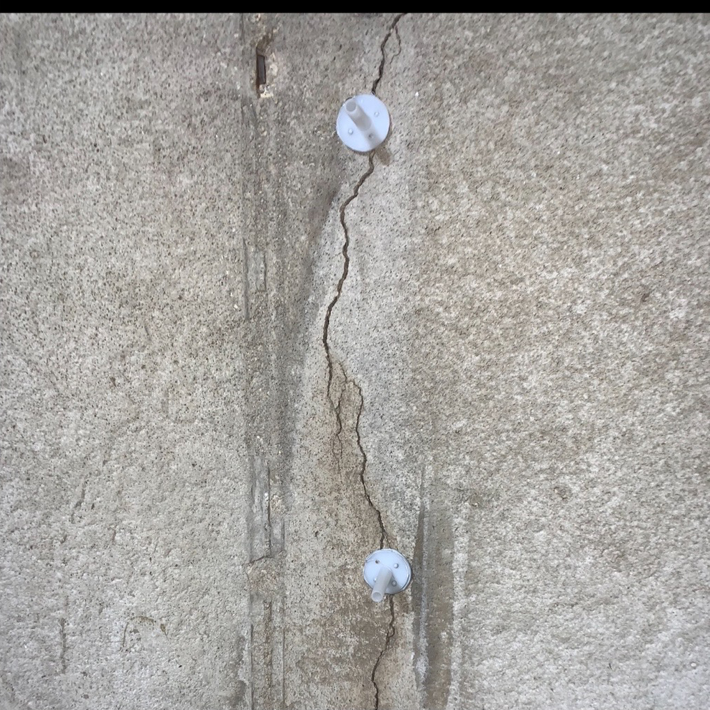 foundation wall crack ready to be filled with injection ports installed